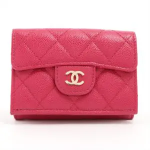 Chanel red A designer brand focused on Haute Couture. Chanel selects only the best materials for their accessories.